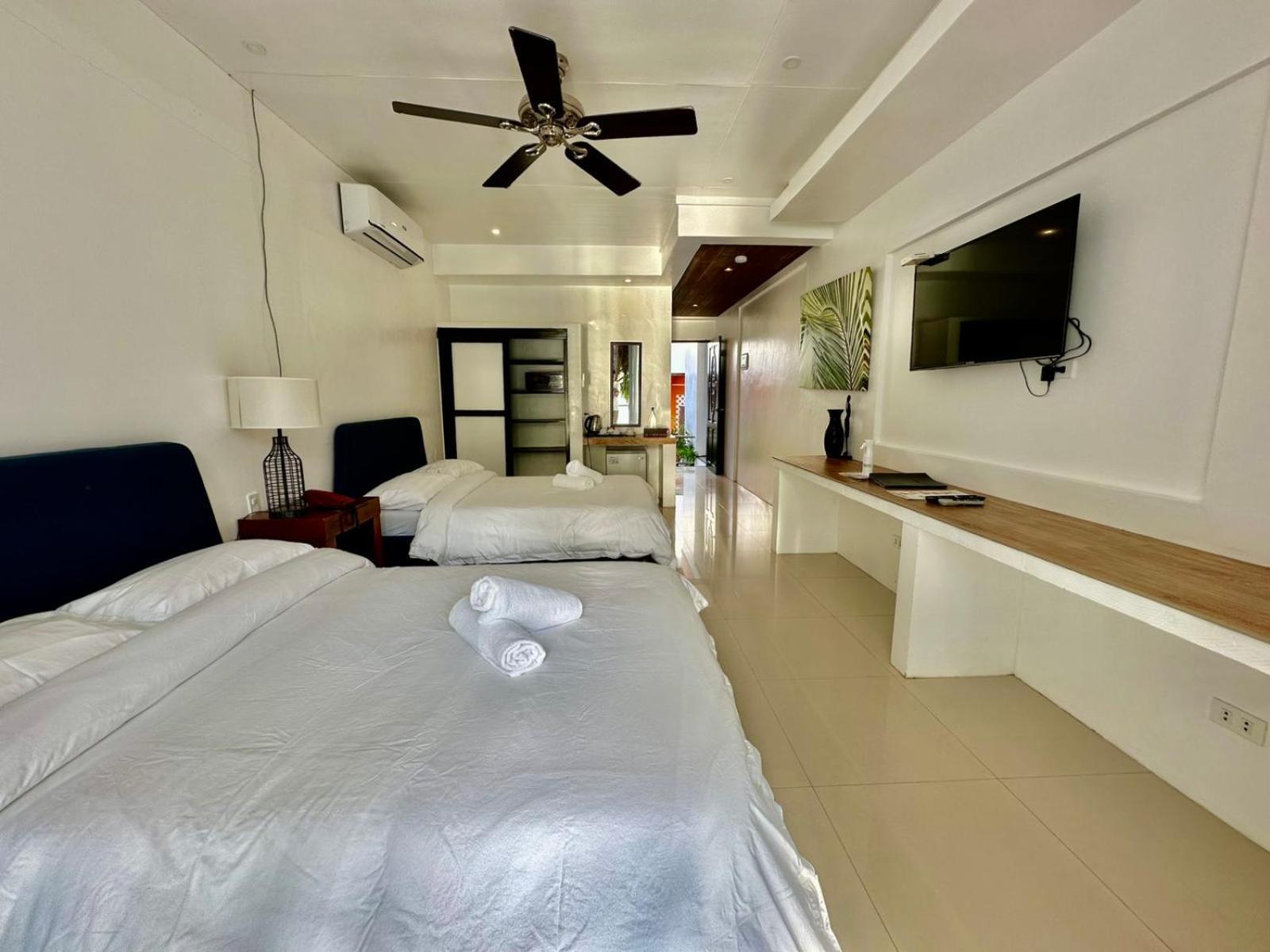 Calypso Beach And Dive Resort Manoc-Manoc Exterior foto
